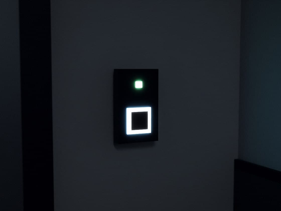 An access control reader on the wall beside a secure door